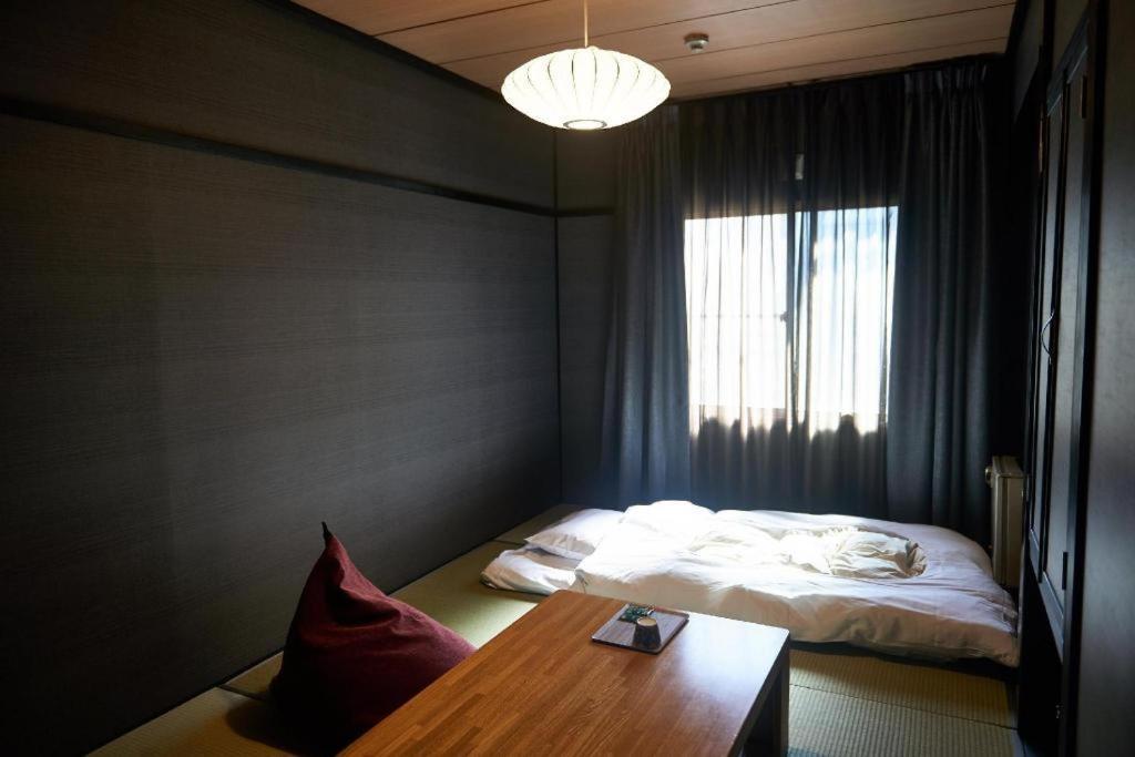 Sounkyo Onsen Kumoi Hotel Kamikava Kültér fotó