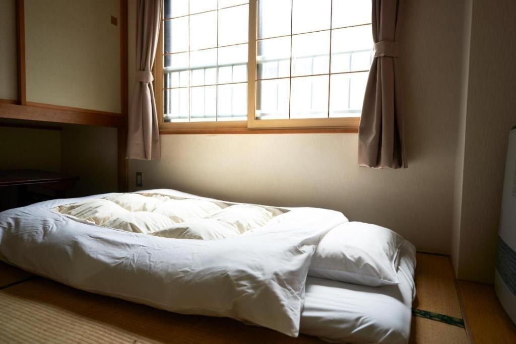 Sounkyo Onsen Kumoi Hotel Kamikava Kültér fotó