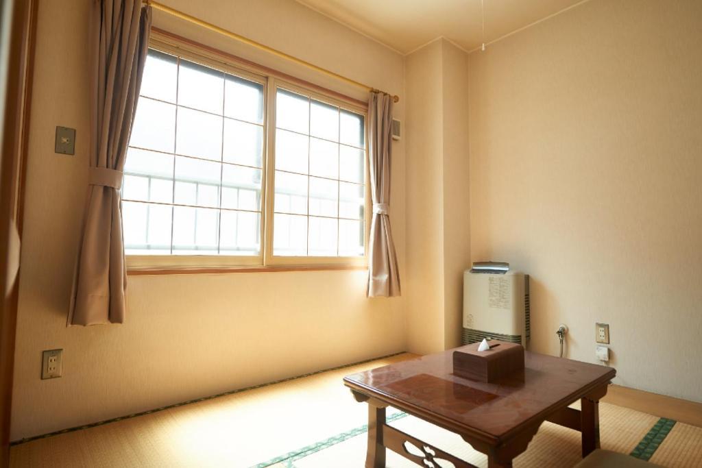 Sounkyo Onsen Kumoi Hotel Kamikava Kültér fotó